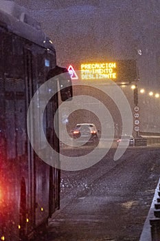 Bus in Alacala street with hevy snow due to Filomena Storm. \