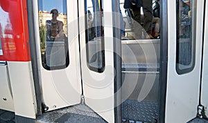 Bus doors of public transport and people traveling with it