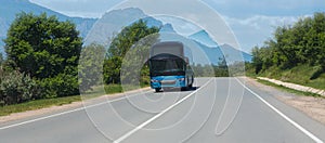 Bus moves along a suburban highway