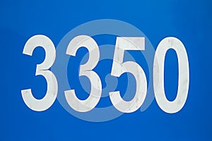 Bus number. A close-up of 3350 aboard a blue old passenger bus. Retro transport