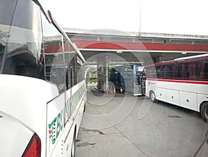 Bus queues at gas stations