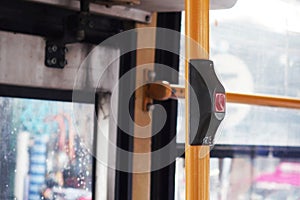 Bus`s electric bell ringing switch handy install on yellow handrail pipe