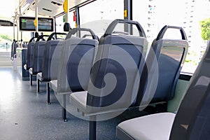 Bus seats on empty double decker bus. Blank advertising space; for mockup display; bus seat sticker wrap