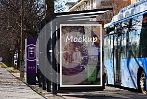 bus shelter at a busstop. sample billboard and mockup base of lightbox.