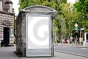 Bus shelter with white advertising lightbox poster ad panel