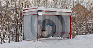 Bus station in Dubovica village in east Slovakia in snow frosty morning