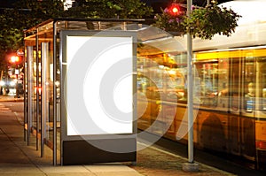 Bus Stop Billboard at Night photo