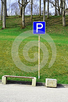 Bus stop with blue traffic sign