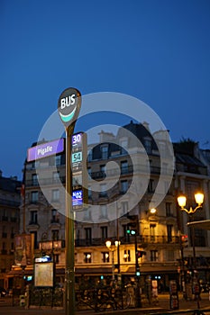 Bus stop early in the morning in Paris