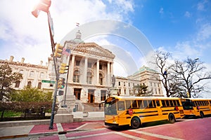 Bus stop in front of Indiana Statehouse building photo