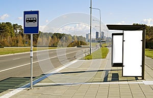 Bus stop on a highway near to a megacity