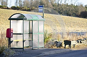 Bus stop shelter rural countryside uk public transport free travel pensioner senior person commute