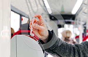 Bus ticket insert validator hand background