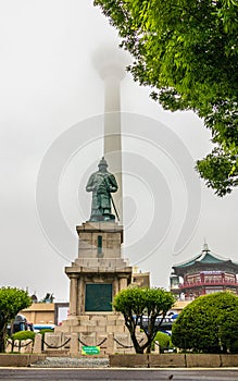 Busan Tower Complex, Pavillion and Statue of Admiral Yi Sun-sin on a foggy day. Jung-gu, Busan, South Korea. Asia