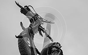 Busan Tower with korean Dragon Statue in front on a foggy day. Jung-gu, Busan, South Korea. Asia