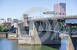 Buscle Morrison Bridge across Willamette River in Portland down town