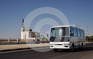 Buses on the background of the mosque.