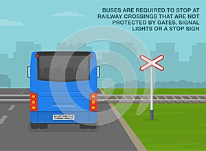 Buses and other public vehicles are required to stop at railway crossings. Back view of a bus stopped at level crossing.