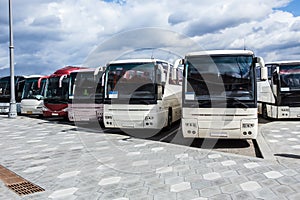 buses on parking on the background of cloudy sky