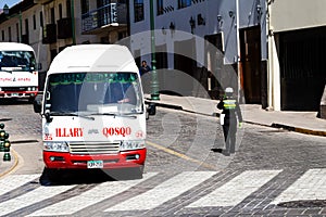 Buses And Policia Transito On Street Of Cusco Peru