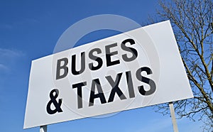 Buses and taxis sign.