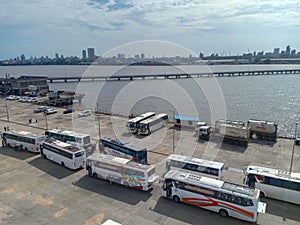 Buses waiting in mumbai port to repatriate Indian crew members