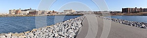 Bush Terminal Park, an old pier remade into a breakwater groyne with walkway, panoramic veiw of the semi-abandoned industrial area