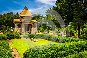 Bushes and mausoleum at Oakland Cemetary in Atlanta, Georgia.