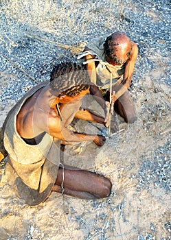 Bushmen making fire