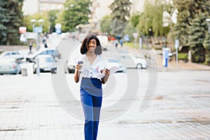 Busiess africn american woman walking