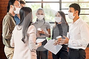 Businee person discussion meeting with face mask
