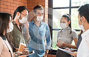 Businee person discussion meeting with face mask