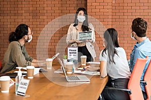Businee person meeting with face mask photo