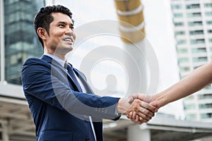 A businees man success and made an agreement with customer