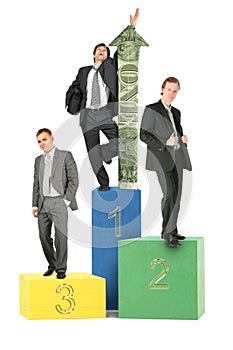 Businesmen on wood toy blocks with dollar arrow