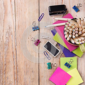 Business accessories, supplies, mug with pencils on rustic wooden table