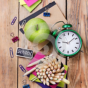 Business accessories, supplies, mug with pencils on rustic wooden table