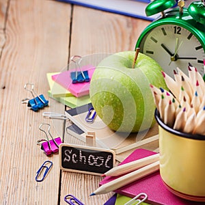 Business accessories, supplies, mug with pencils on rustic wooden table