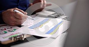 Business Accountant Using Finance Chart Document