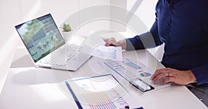 Business Accountant Using Finance Chart Document