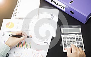 Business accountants with documents graph financial on office