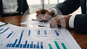 Business accounting team meeting in room office using pen pointing at paperwork. finance . Concept