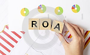 Business Acronym ROA, Return on assets, business investment concept