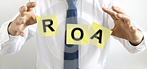 Business Acronym ROA, Return on assets, business investment concept