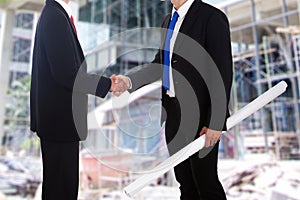 Business agreement at construction site