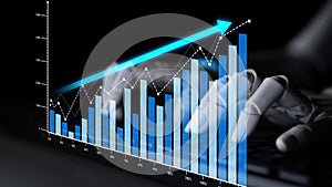 Business Analysis of Financial Progress Graph Showing Growth Trend with Hand on Keyboard and Data Chart Representation