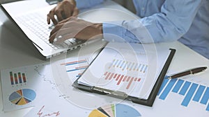 Business analysis - man working with financial data charts