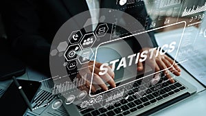 Business Analysis with Statistics and Data Visualization on Modern Laptop at Office Desk. Asymptotic smart data analytic
