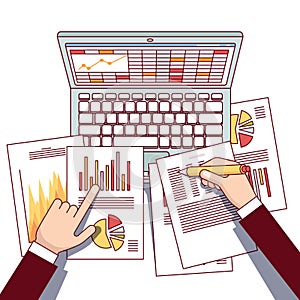 Business analyst hands holding statistical data