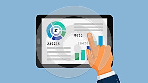 Business analytic graph report on tablet computer